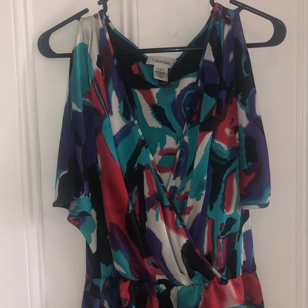 Calvin Klein silk blouse, singed waist.
